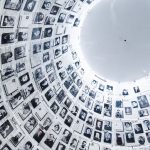 Black/white photos of victims on domed ceiling at Yad Vashem Holocaust Remembrance Center as seen during the Israel Highlights Tour